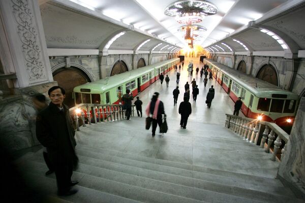 Pedestrians walk through Puhung (meaning rehabilitation) subway station in the North Korean capital of Pyongyang (File) - Sputnik International