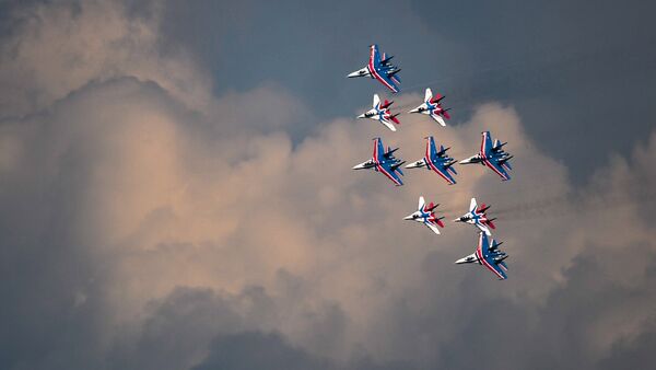 Russian Knights and Swifts aerobatic teams train for the upcoming Victory Day Parade in Moscow. - Sputnik International