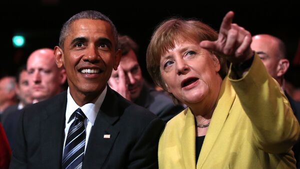 US President Barack Obama (L) and German Chancellor Angela Merkel sit during the official opening ceremony of the Hanover industry Fair at the Hannover Congress Center HCC in Hanover, on April 24, 2016 - Sputnik International