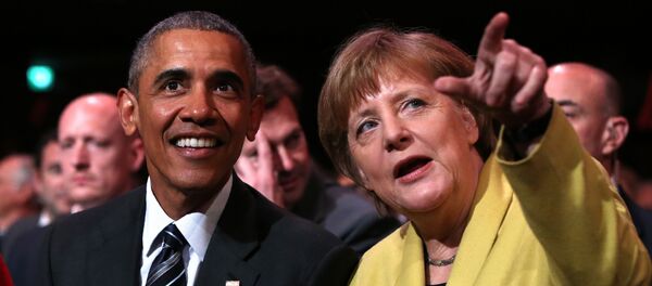 US President Barack Obama (L) and German Chancellor Angela Merkel sit during the official opening ceremony of the Hanover industry Fair at the Hannover Congress Center HCC in Hanover, on April 24, 2016 - Sputnik International