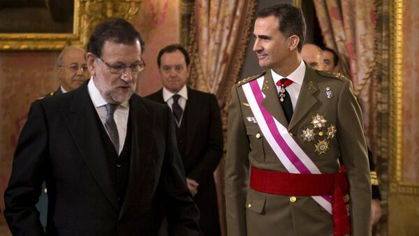 In this Wednesday, Jan. 6, 2016 file photo, Spain's King Felipe VI walks with Spain's Prime Minister Mariano Rajoy, left, during the annual Pascua Militar Epiphany ceremony at the Royal Palace in Madrid, Spain - Sputnik International