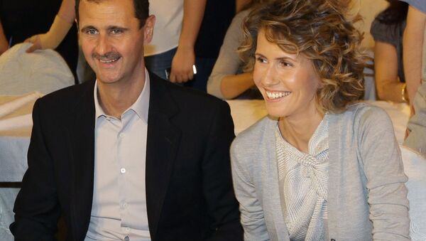 Syrian President Bashar Assad and his wife Asma. file photo - Sputnik International