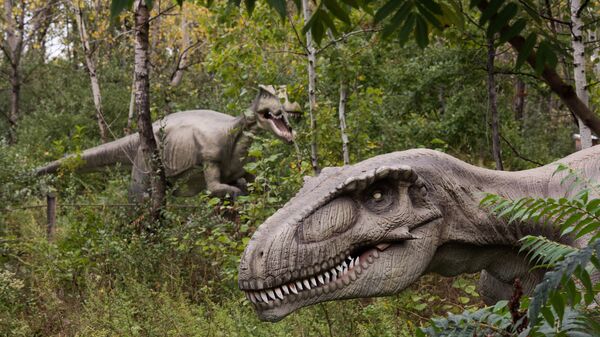 Life-sized animatronic dinosaurs are seen at Field Station: Dinosaurs, a 20-acre outdoor Jurassic learning expedition and family tourist attraction in Secaucus, N.J. on Thursday, Sept. 25, 2014 - Sputnik International