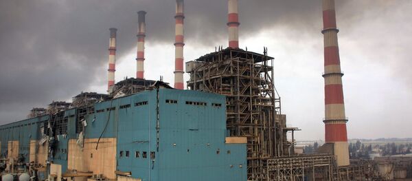 A general view shows smoke billowing from Aleppo's thermal power plant after re-taking Syrian government forces re-took the area on the eastern outskirts of Syria's northern embattled city of Aleppo from Islamic State (IS) group fighters (File) A general view shows smoke billowing from Aleppo's thermal power plant after re-taking Syrian government forces re-took the area on the eastern outskirts of Syria's northern embattled city of Aleppo from Islamic State (IS) group fighters (File) - Sputnik International