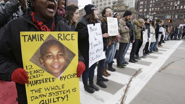 FILE- In this Nov. 25, 2014, file photo, demonstrators block Public Square Tuesday, Nov. 25, 2014, in Cleveland, during a protest over the police shooting of 12-year-old Tamir Rice - Sputnik International