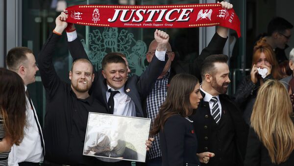 Relatives react after the jury delivered its verdict at the new inquests into the Hillsborough disaster, in Warrington, Britain April 26, 2016. - Sputnik International