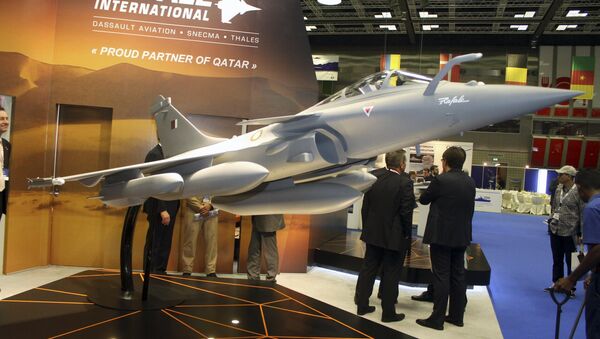A model of Dassault Rafale fighter jet is seen during Doha International Maritime Defence Exhibition, Qatar March 31, 2016. - Sputnik International