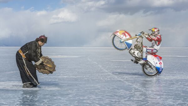 When faced with the danger of falling through the thin ice of Lake Baikal, moto racer Daniil Ivanov asked for the help of a local shaman to bless his risky endeavor. - Sputnik International