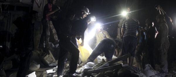Civil defence members search for survivors after an airstrike at a field hospital in the rebel held area of al-Sukari district of Aleppo, Syria April 27, 2016 Civil defence members search for survivors after an airstrike at a field hospital in the rebel held area of al-Sukari district of Aleppo, Syria April 27, 2016 - Sputnik International