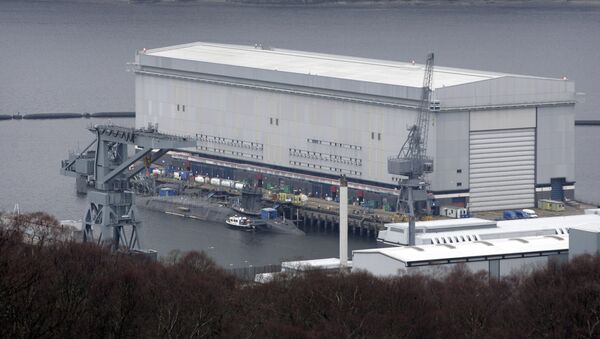 A trident submarine is pictured with a long lens at the Faslane naval base, Scotland (file) - Sputnik International