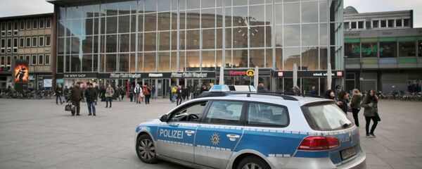 A police car passes the central railway station in Cologne, Germany. (File) A police car passes the central railway station in Cologne, Germany. (File) - Sputnik International