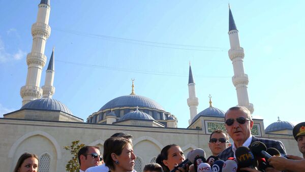 Turkish President Recep Tayyip Erdogan speaks to the media after Eid Al-Fitr prayers in Istanbul. - Sputnik International
