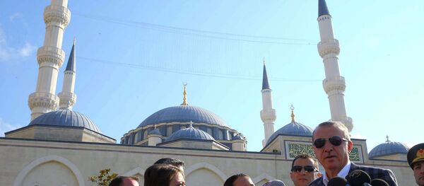 Turkish President Recep Tayyip Erdogan speaks to the media after Eid Al-Fitr prayers in Istanbul. - Sputnik International