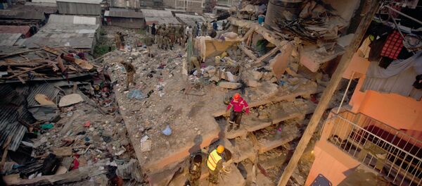 Rescuers work at the site of a building collapse in Nairobi, Kenya, Saturday, April 30, 2016 Rescuers work at the site of a building collapse in Nairobi, Kenya, Saturday, April 30, 2016 - Sputnik International