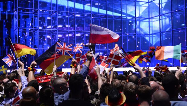 Supporters wave flags ahead of the Eurovision Song Contest 2014 Grand Final in Copenhagen, Denmark, on May 10, 2014 - Sputnik International