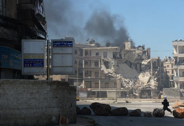 Militants shell a district in Aleppo. File photo Militants shell a district in Aleppo. File photo - Sputnik International