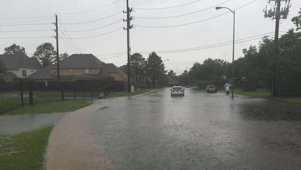 In this April 18, 2016 a view of flooded streets in the Kelliwood Park neighborhood of Katy, Texas. - Sputnik International