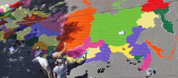 Graffiti artists paint a map of Russia in front of the building of Moscow State Mapping and Geodesy University Graffiti artists paint a map of Russia in front of the building of Moscow State Mapping and Geodesy University - Sputnik International