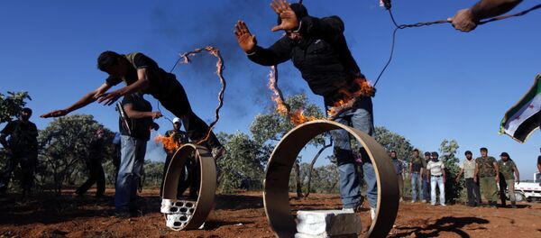 Free Syrian Army members train on the outskirts of Idlib, Syria (File) Free Syrian Army members train on the outskirts of Idlib, Syria (File) - Sputnik International