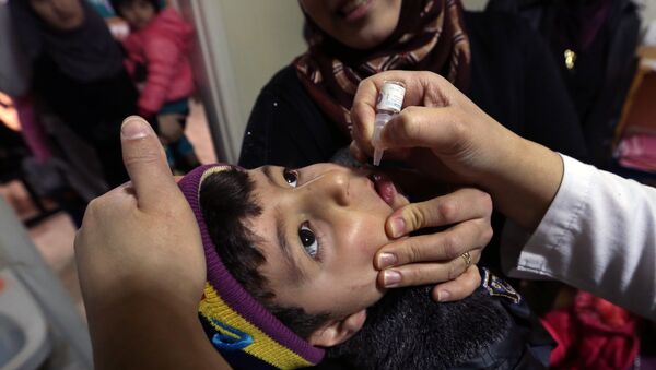 Syrian refugee Mohammed Sammor, 3, receives vaccination against polio (File) - Sputnik International
