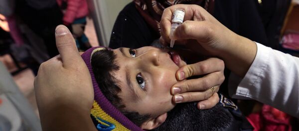 Syrian refugee Mohammed Sammor, 3, receives vaccination against polio (File) - Sputnik International