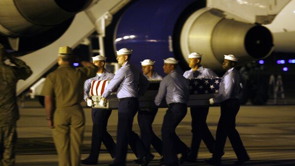 A Navy carry team carries the transfer case (File) - Sputnik International