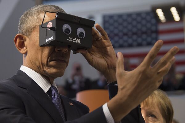 US President Barack Obama looks through a virtual reality device at the booth of German automation company ifm electronic as he tours with the German chancellor the Hanover industrial Fair in Hanover, central Germany, on April 25, 2016 US President Barack Obama looks through a virtual reality device at the booth of German automation company ifm electronic as he tours with the German chancellor the Hanover industrial Fair in Hanover, central Germany, on April 25, 2016 - Sputnik International