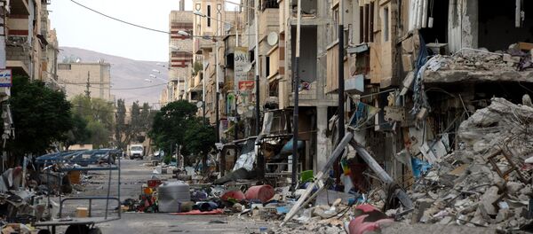 Destroyed buildings in Palmyra. - Sputnik International