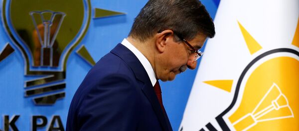 Turkish Prime Minister Ahmet Davutoglu leaves a news conference at his ruling AK Party headquarters in Ankara, Turkey May 5, 2016. - Sputnik International