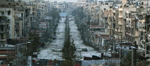 A general view shows a damaged street with sandbags used as barriers in Aleppo's Saif al-Dawla district, Syria March 6, 2015. A general view shows a damaged street with sandbags used as barriers in Aleppo's Saif al-Dawla district, Syria March 6, 2015. - Sputnik International