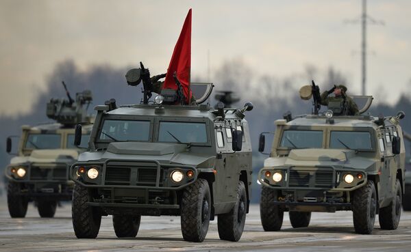 Armored vehicles Tigr of the mechanized columns of the Central Military District's Moscow Garrison during the rehearsal of the military parade to mark the 71st Anniversary of the Victory in the Great Patriotic War, at the Alabino training ground, Moscow Region Armored vehicles Tigr of the mechanized columns of the Central Military District's Moscow Garrison during the rehearsal of the military parade to mark the 71st Anniversary of the Victory in the Great Patriotic War, at the Alabino training ground, Moscow Region - Sputnik International
