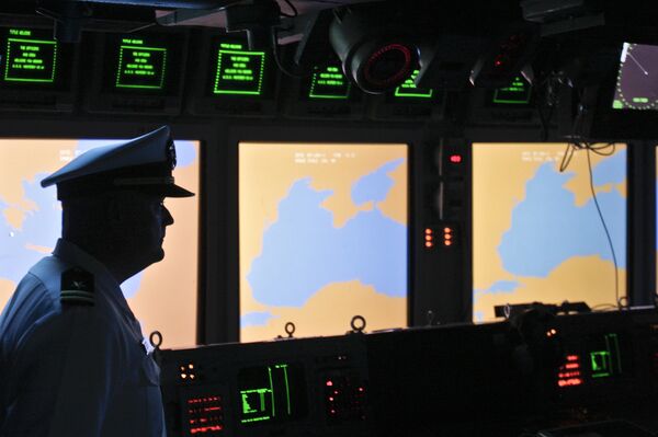 A US Navy officer, name not available, looks on at the weapons control deck of the USS Monterey in the Black Sea port of Constanta, Romania, Tuesday, June 7, 2011 A US Navy officer, name not available, looks on at the weapons control deck of the USS Monterey in the Black Sea port of Constanta, Romania, Tuesday, June 7, 2011 - Sputnik International