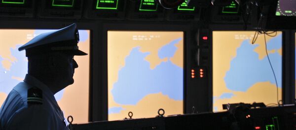 A US Navy officer, name not available, looks on at the weapons control deck of the USS Monterey in the Black Sea port of Constanta, Romania, Tuesday, June 7, 2011 - Sputnik International
