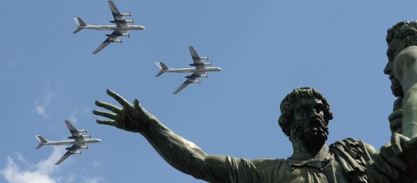 The Tu-95 bombers seen flying over Moscow's Red Square during the rehearsal of the May 9 Victory Day Parade - Sputnik International