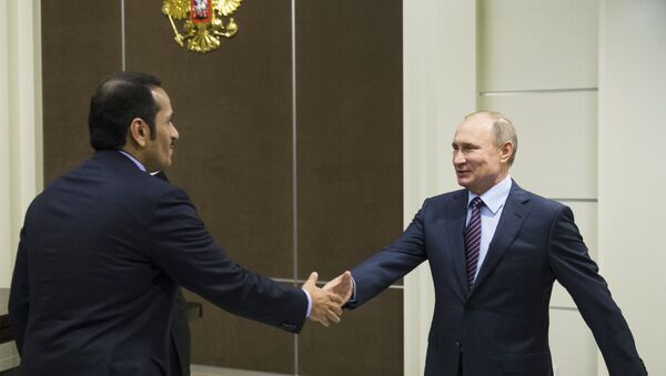 Russian President Vladimir Putin, right, shakes hands with Qatar Foreign Minister Mohammed bin Abdulrahman bin Jassim Al-Thani before their meeting in Sochi, Russia, Friday, May 6, 2016 - Sputnik International
