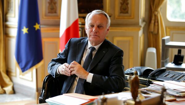 French Foreign Affairs Minister Jean-Marc Ayrault poses in his office at the Quai d'Orsay ministry in Paris, France, April 26, 2016 - Sputnik International