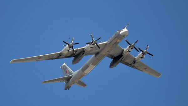 The Tu-95MS is seen flying during the rehearsal of the May 9 Victory Day Parade in Moscow - Sputnik International