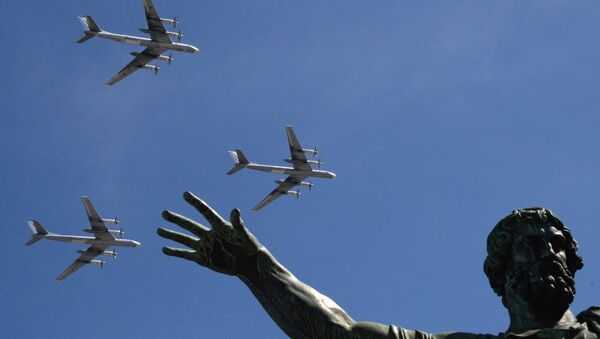 The Tu-95MS bombers are seen flying during the rehearsal of the May 9 Victory Day Parade in Moscow - Sputnik International