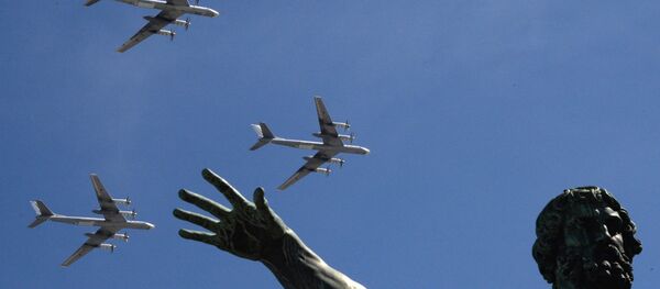 The Tu-95MS bombers are seen flying during the rehearsal of the May 9 Victory Day Parade in Moscow - Sputnik International