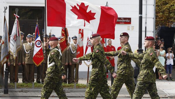 A military unit from Canada marches during a military parade marking Polish Armed Forces Day, in Warsaw, Poland (File) - Sputnik International