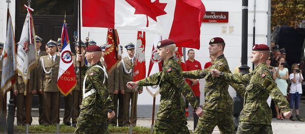 A military unit from Canada marches during a military parade marking Polish Armed Forces Day, in Warsaw, Poland (File) A military unit from Canada marches during a military parade marking Polish Armed Forces Day, in Warsaw, Poland (File) - Sputnik International