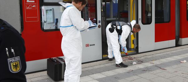 Police investigate the scene of a stabbing at a station in Grafing near Munich, Germany, Tuesday, May 10, 2016 Police investigate the scene of a stabbing at a station in Grafing near Munich, Germany, Tuesday, May 10, 2016 - Sputnik International