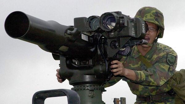 A military soldier operates a TOW anti-tank missile launcher. File photo - Sputnik International