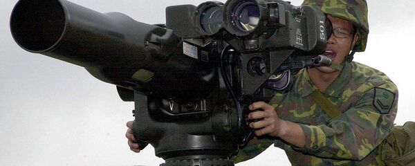 A military soldier operates a TOW anti-tank missile launcher. File photo - Sputnik International