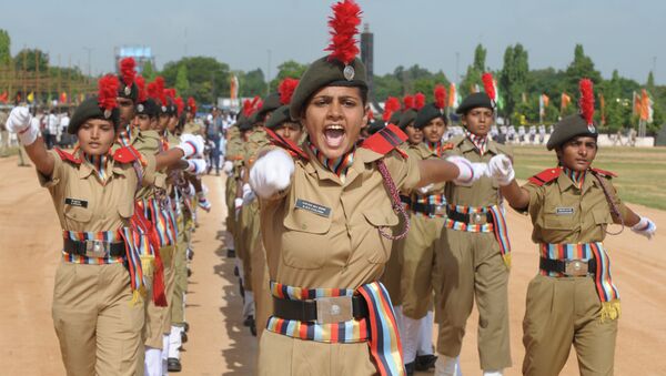 Female National Cadet Corps Commander N.M.R. Sanjana leads a march past during a full dress rehearsal for Independence Day celebrations in Secunderabad, the twin city of Hyderabad, on August 13, 2012 - Sputnik International
