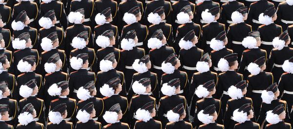 Female military cadets march through Red Square during the Victory Day military parade in Moscow on May 9, 2015 Female military cadets march through Red Square during the Victory Day military parade in Moscow on May 9, 2015 - Sputnik International