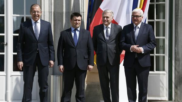 Foreign ministers Sergei Lavrov of Russia, Pavlo Klimkin of Ukraine, Jean-Marc Ayrault of France and Frank-Walter Steinmeier of Germany (L-R) pose for a picture outside German foreign ministry's guest house Villa Borsig in Berlin, Germany, May 11, 2016, ahead of their meeting to discuss Ukraine crisis - Sputnik International