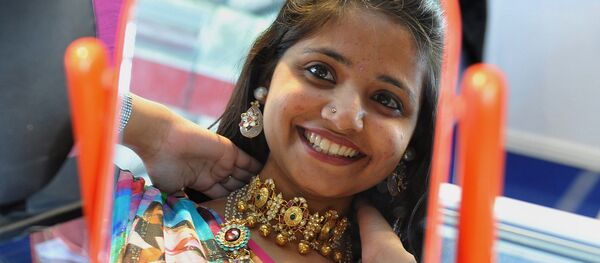 An Indian woman looks in the mirror (File) An Indian woman looks in the mirror (File) - Sputnik International