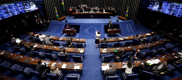 Members of Brazil's Senate, in favor and against the impeachment of President Dilma Rousseff, participate in the debate leading up to the voting in Brasilia, Brazil, May 11, 2016. Members of Brazil's Senate, in favor and against the impeachment of President Dilma Rousseff, participate in the debate leading up to the voting in Brasilia, Brazil, May 11, 2016. - Sputnik International