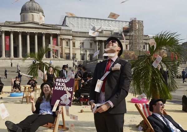 London's Trafalgar Square transformed into an interactive, tropical tax haven by Oxfam, Action Aid and Christian Aid. London's Trafalgar Square transformed into an interactive, tropical tax haven by Oxfam, Action Aid and Christian Aid. - Sputnik International